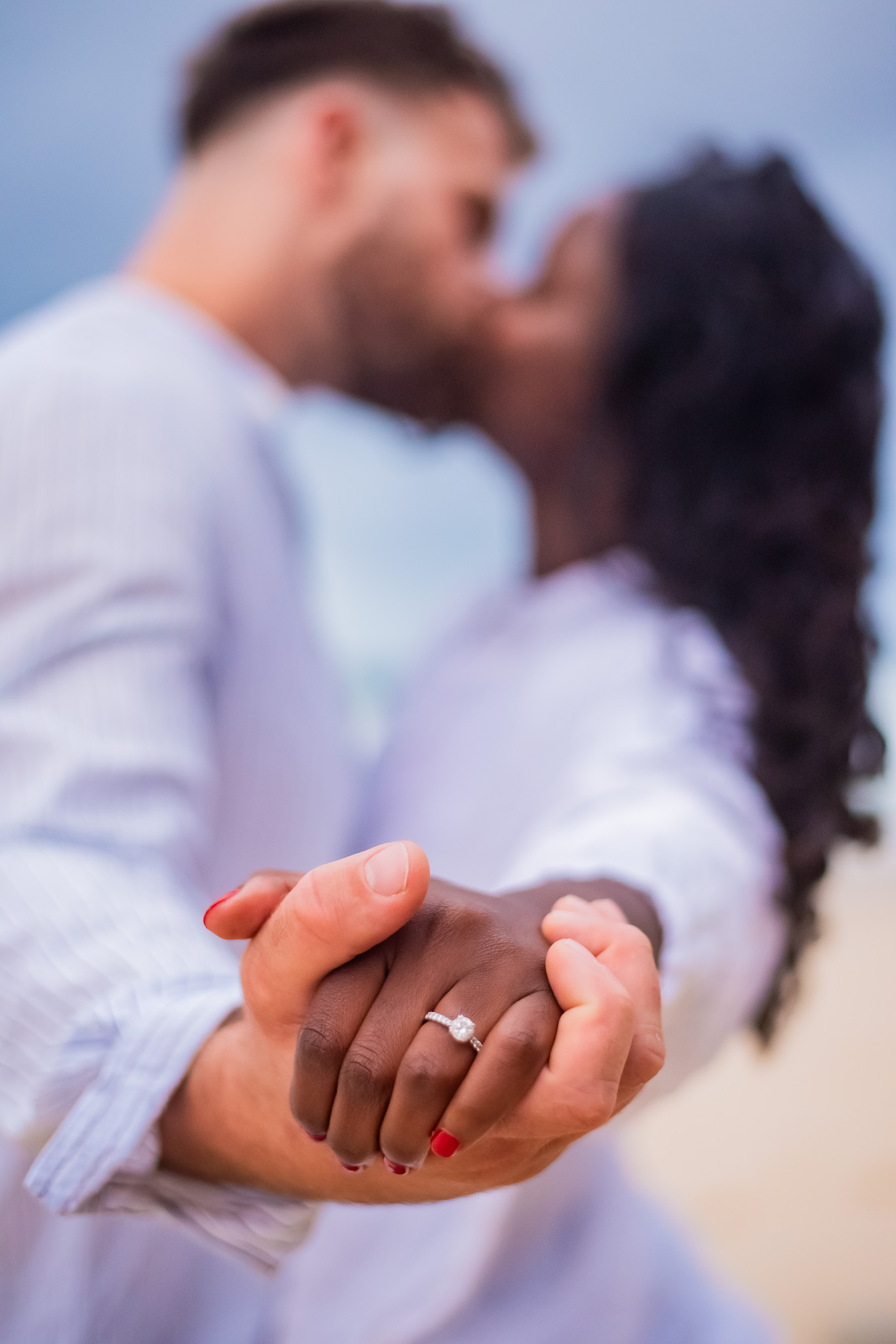 Detail shot of engagement ring on bride-to-be’s hand during a Sydney proposal photoshoot by Veros Photography
