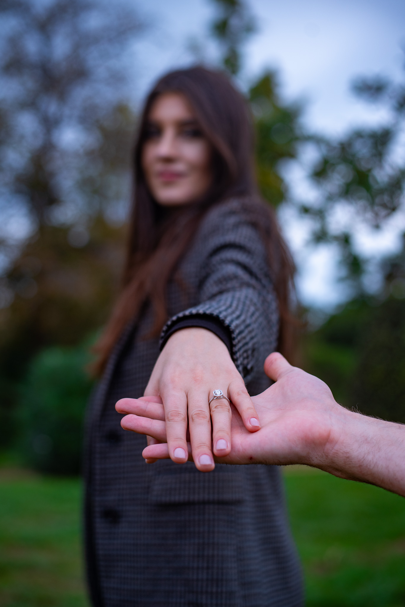Detail shot of engagement ring on bride-to-be’s hand during a Sydney proposal photoshoot by Veros Photography